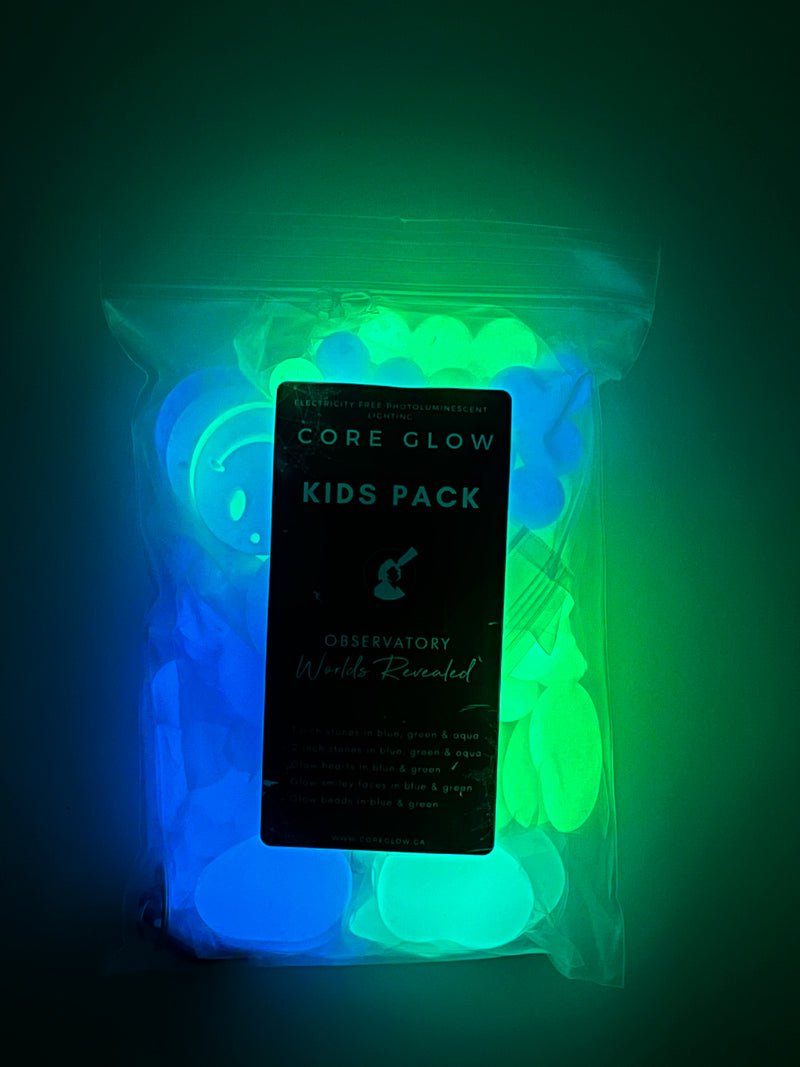 Kids pack of glow stones that are blue, green, aqua in color. Transparent packaging bearing a black label with the Lowell Observatory logo.